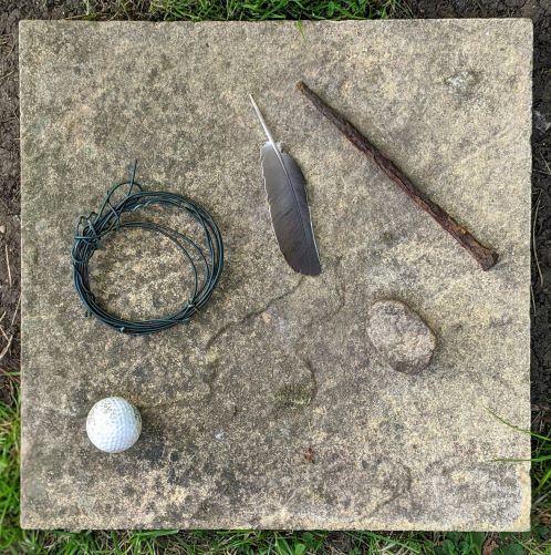 Image: Four non-boules and a jack (golf ball)